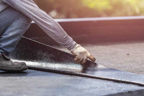 Professional Waterproofing technician working in Rossville, GA